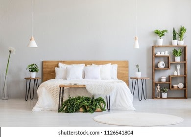 Should A Headboard Touch The Ground?